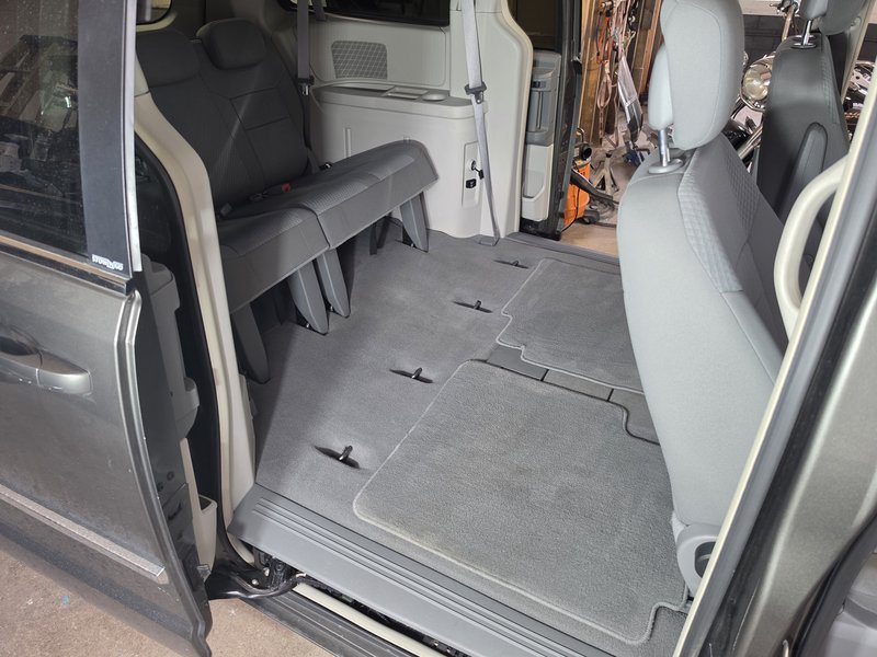 Rear cargo floor vacuumed and detailed, Hartford WI auto detailing