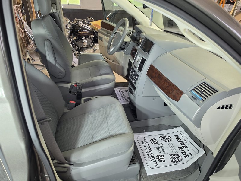 Front seats and dashboard cleaned during a Sudz Up Detailing interior service in Hartford, WI