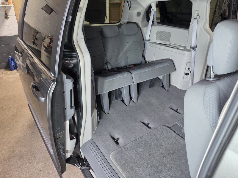 Third row seating detailed in a Chrysler minivan, Hartford WI