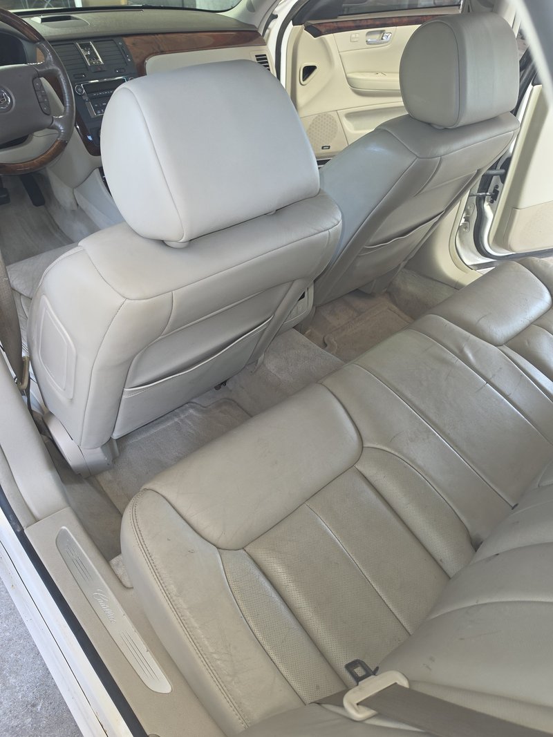 Seats and cabin of an aged luxury sedan detailed by Sudz Up Detailing, Hartford WI