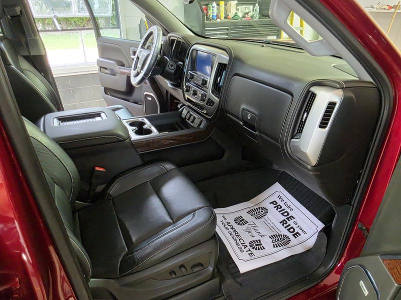 Front cab interior with leather seats and console detailed by Sudz Up Detailing, Hartford WI
