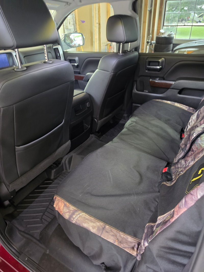 Rear cab seating and floor cleaned during a truck detail in Hartford, WI
